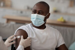 African American man receiving a vaccine